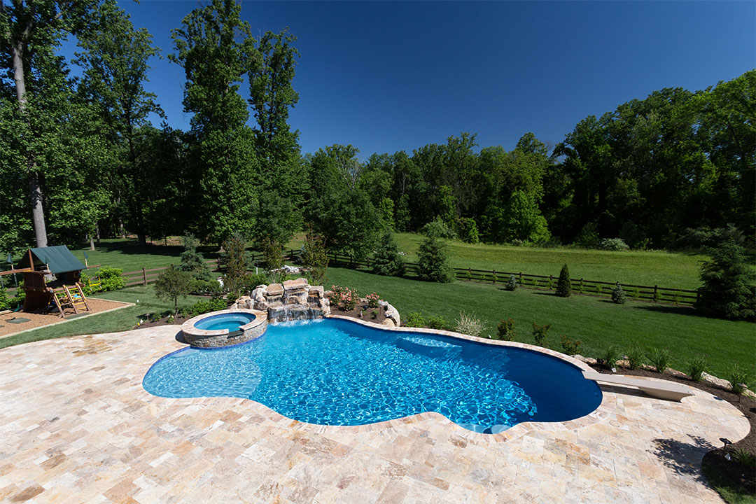 Backyard Free-Form Pool | QuartzScapes Tahoe Blue pool finish