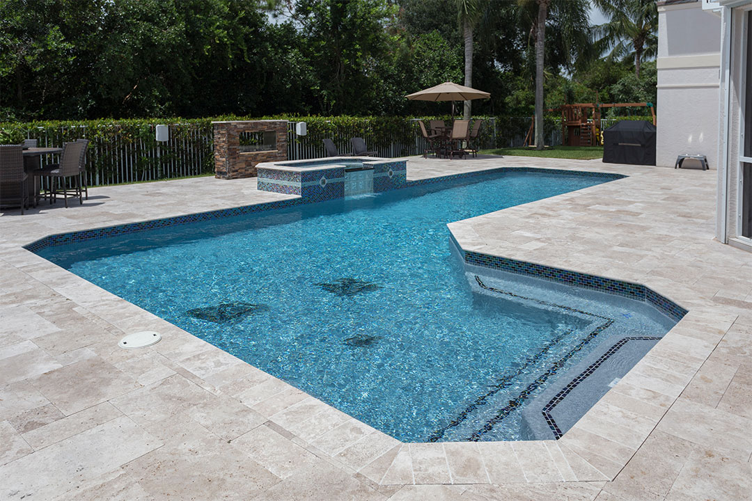 L-Shaped inground Pool with spa
